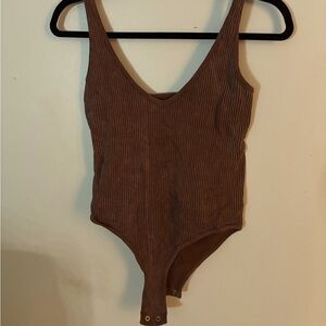 Brown body suit textured